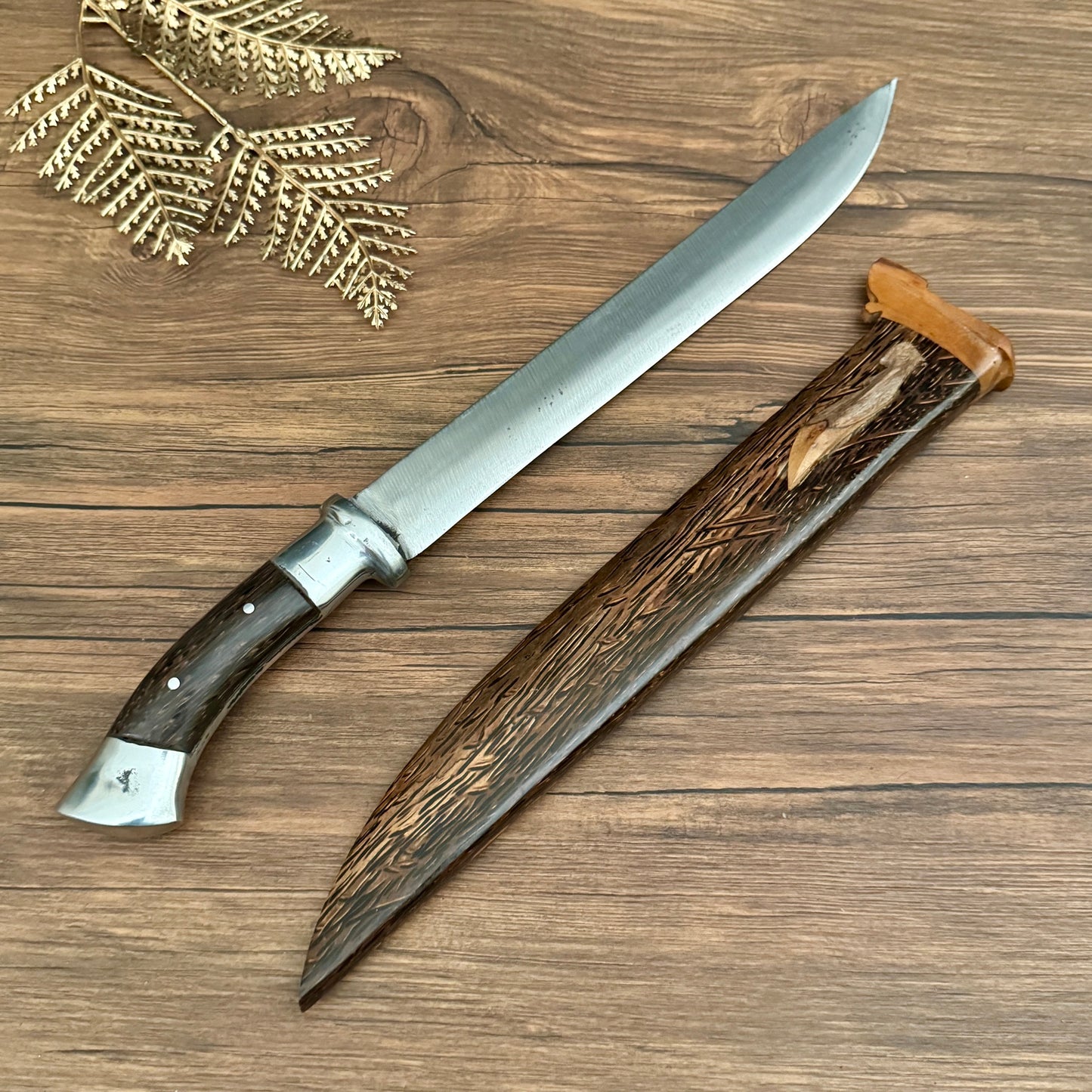 hand carved wood sheath hand-forged golok machete traditional Indonesian motif