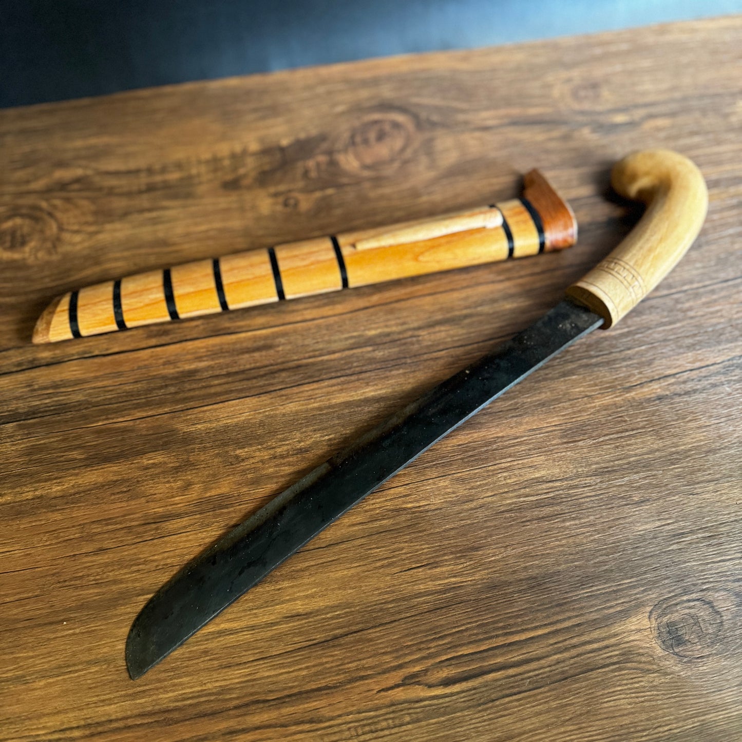 guava wood handle hand-forged golok machete traditional carved detail close up