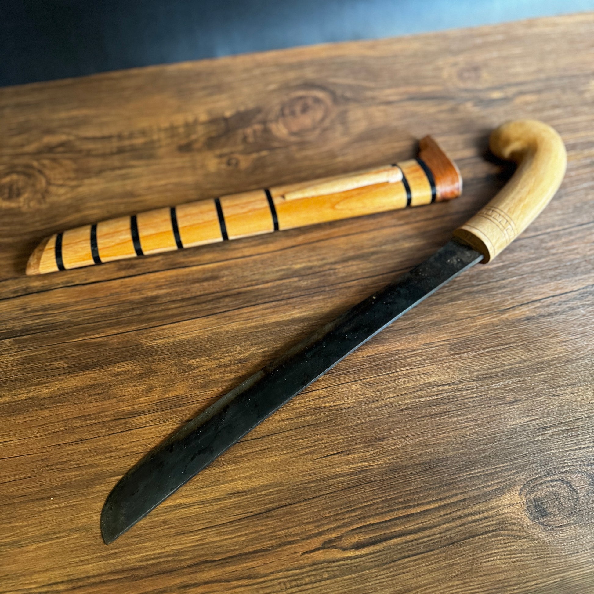 guava wood handle hand-forged golok machete traditional carved detail close up