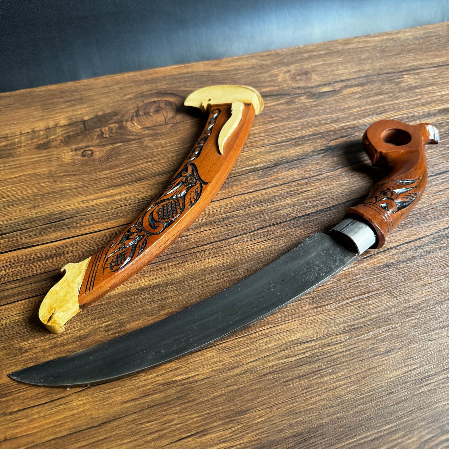 hand forged parang machete curved blade forging marks close up detail