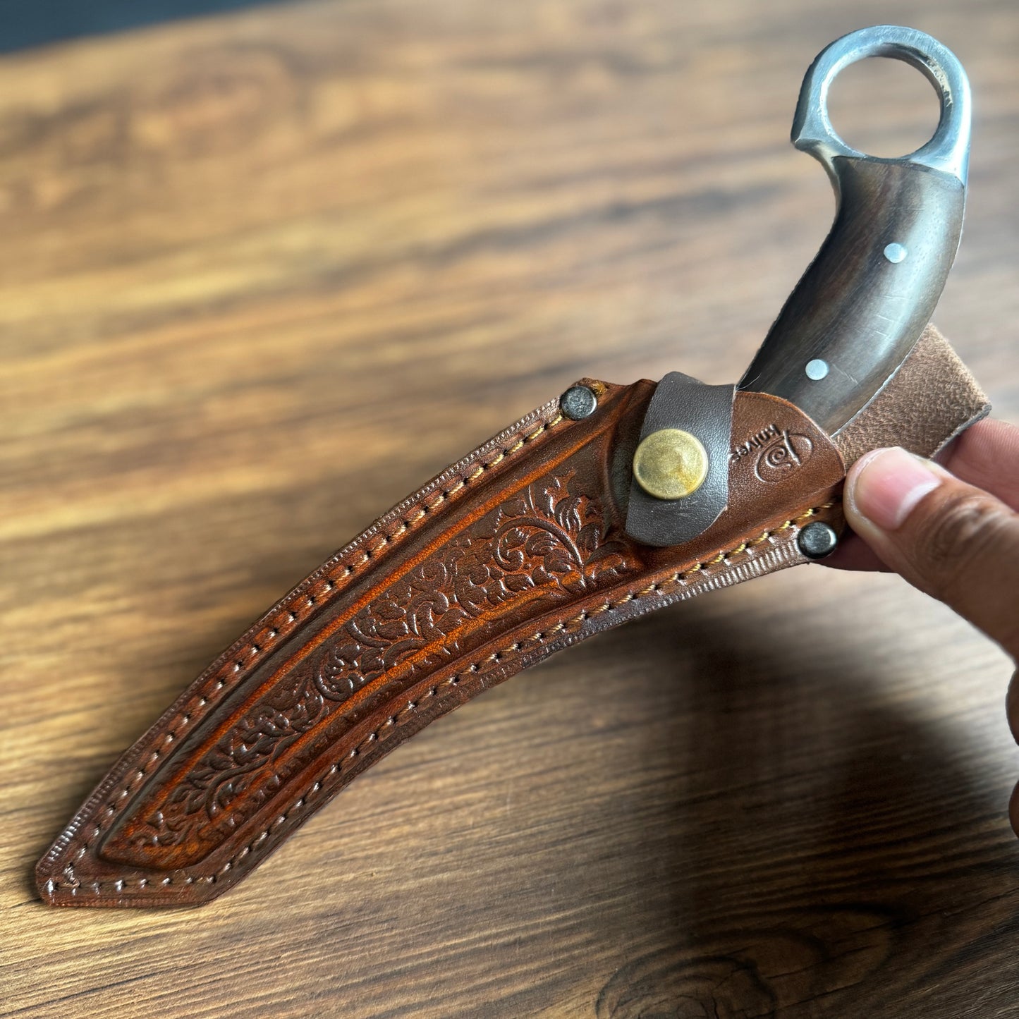 hand-forged skinning knife leather sheath carbon steel blade side profile
