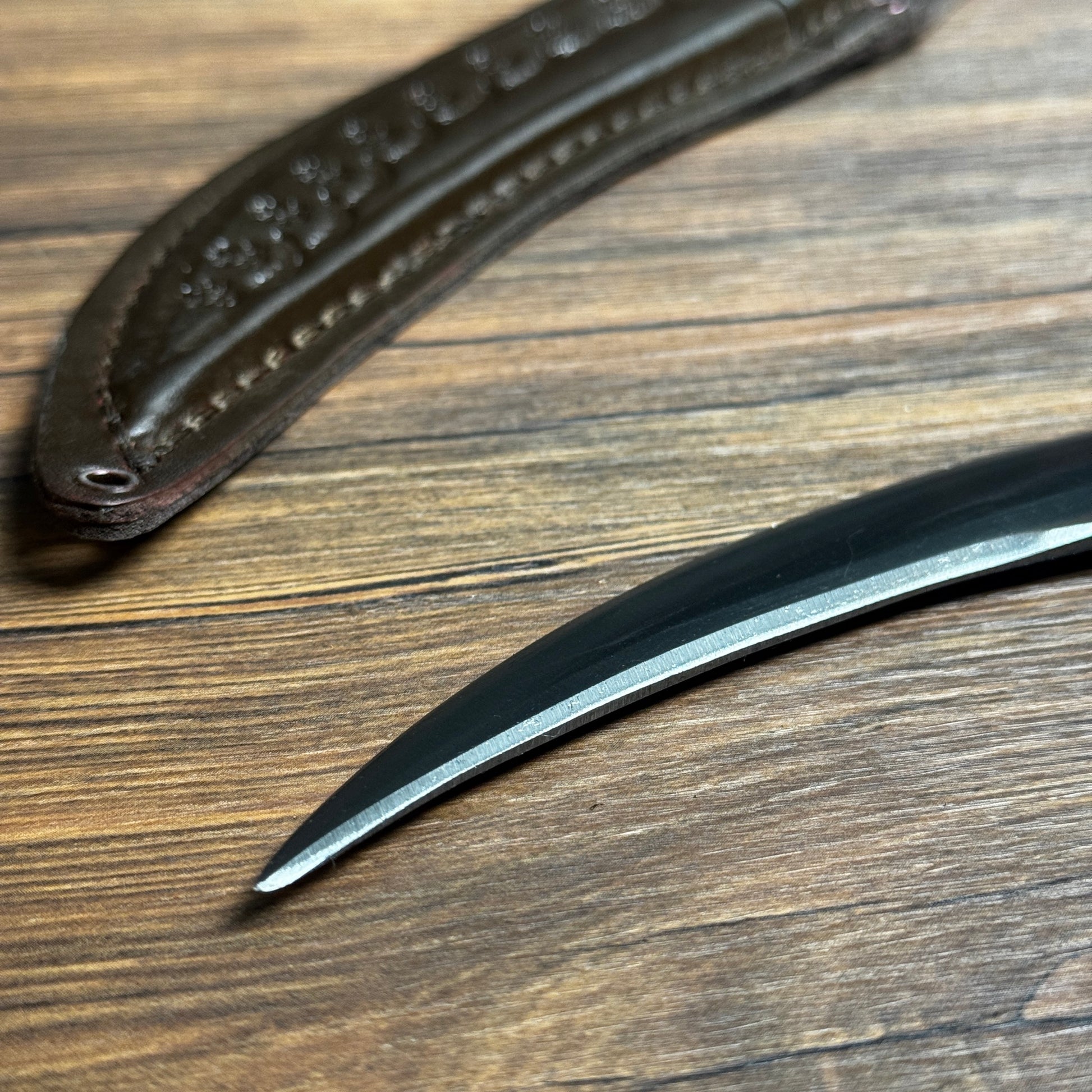 batik leather sheath hand-forged jambiya knife hand stitched indonesian pattern
