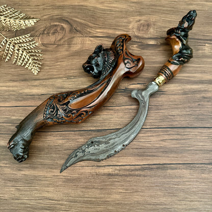 damascus steel hand-forged Indonesian Kujang natural pamor pattern close up