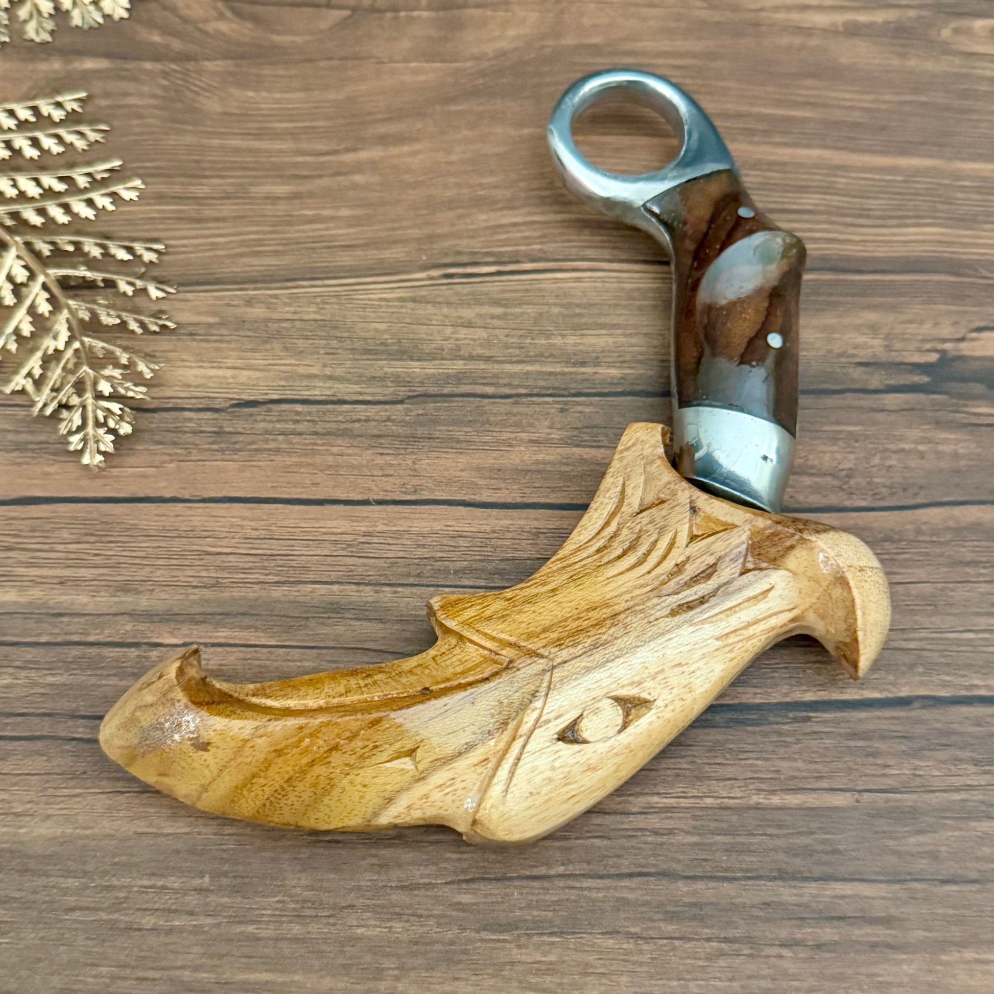 rosewood handle hand-forged karambit spring steel traditional carved grip view