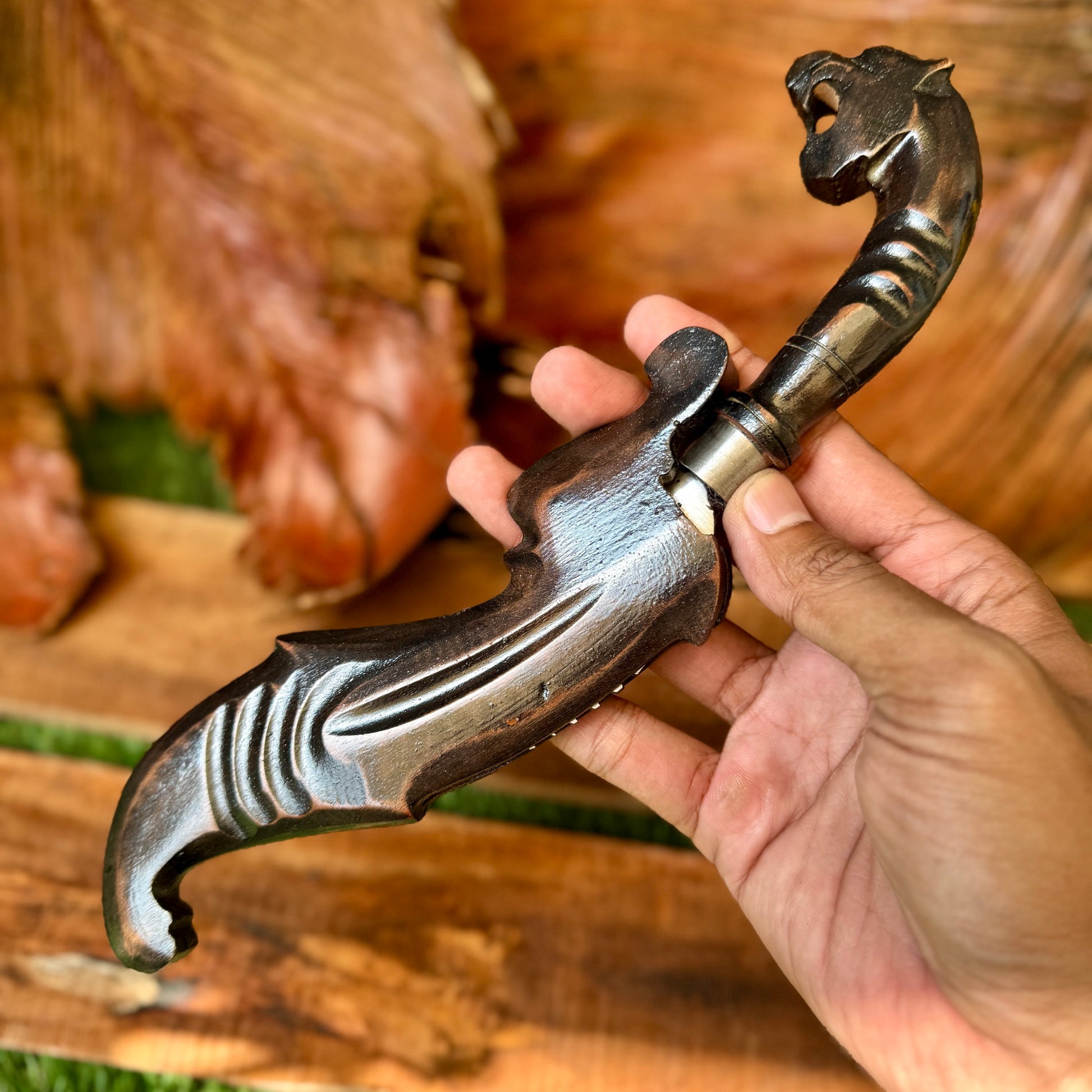 hand-forged Indonesian Kujang spring steel blade sharp side profile view