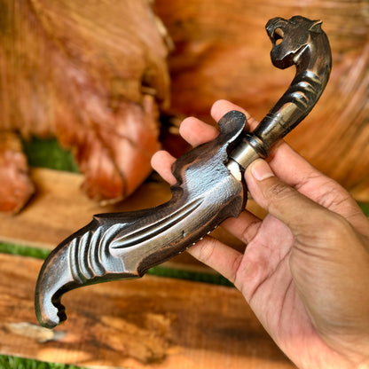 hand-forged Indonesian Kujang spring steel blade sharp side profile view