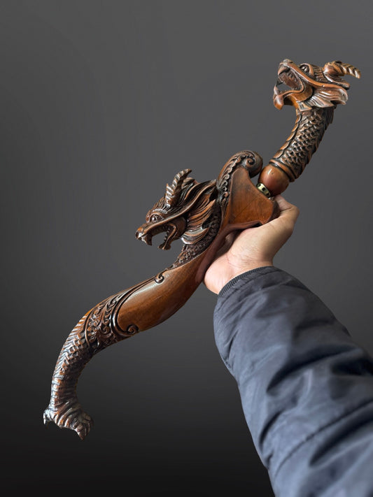 hand-forged Indonesian Kujang Damascus steel blade side profile