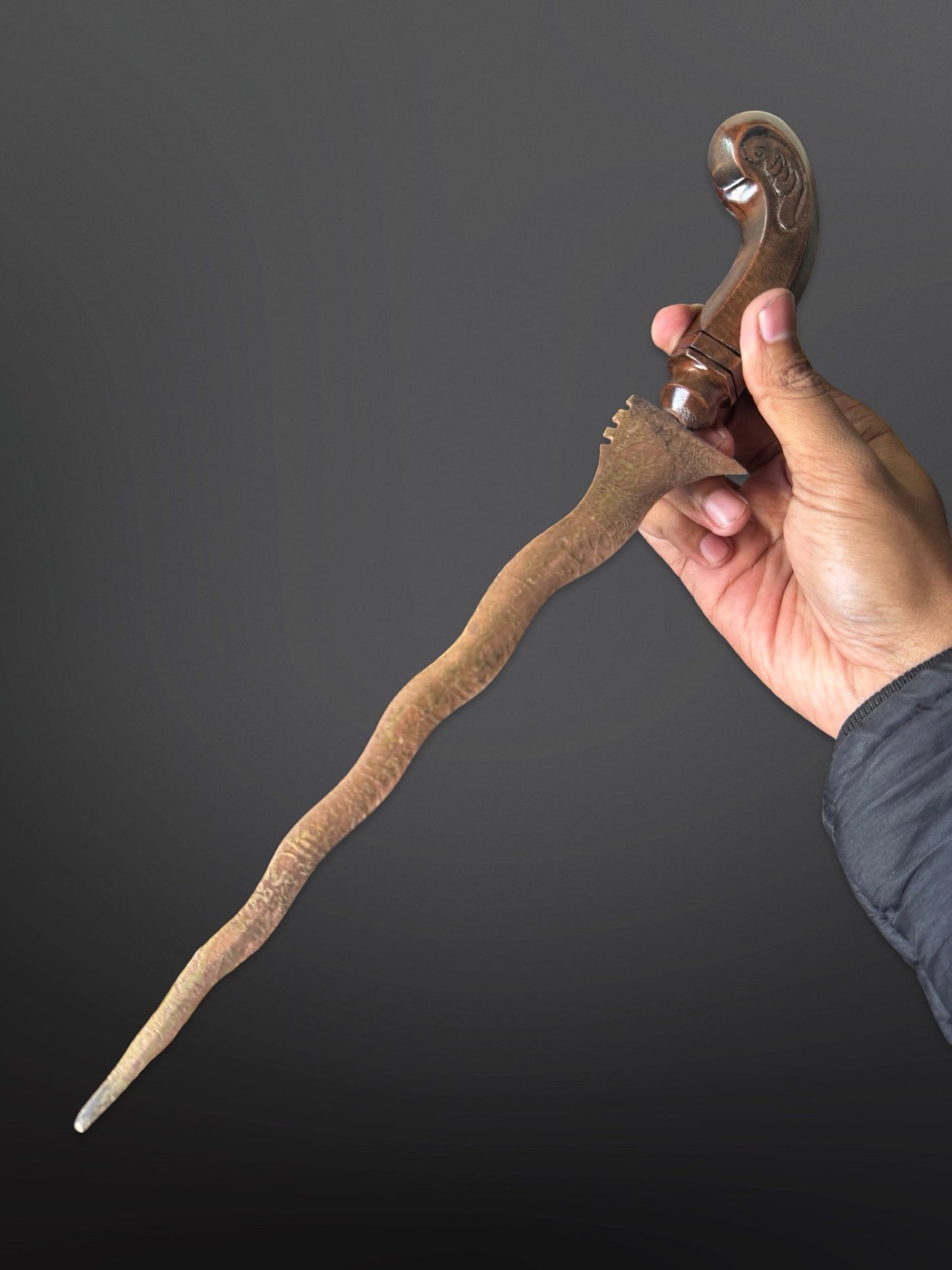 carved teak handle Indonesian kris dagger traditional hand carved detail view